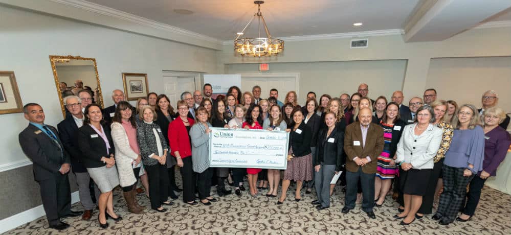 2019 Foundation Group Check Presentation 999x460 1 - The Union Savings Bank Foundation Granted $200,000 to Local Non-Profit Organizations
